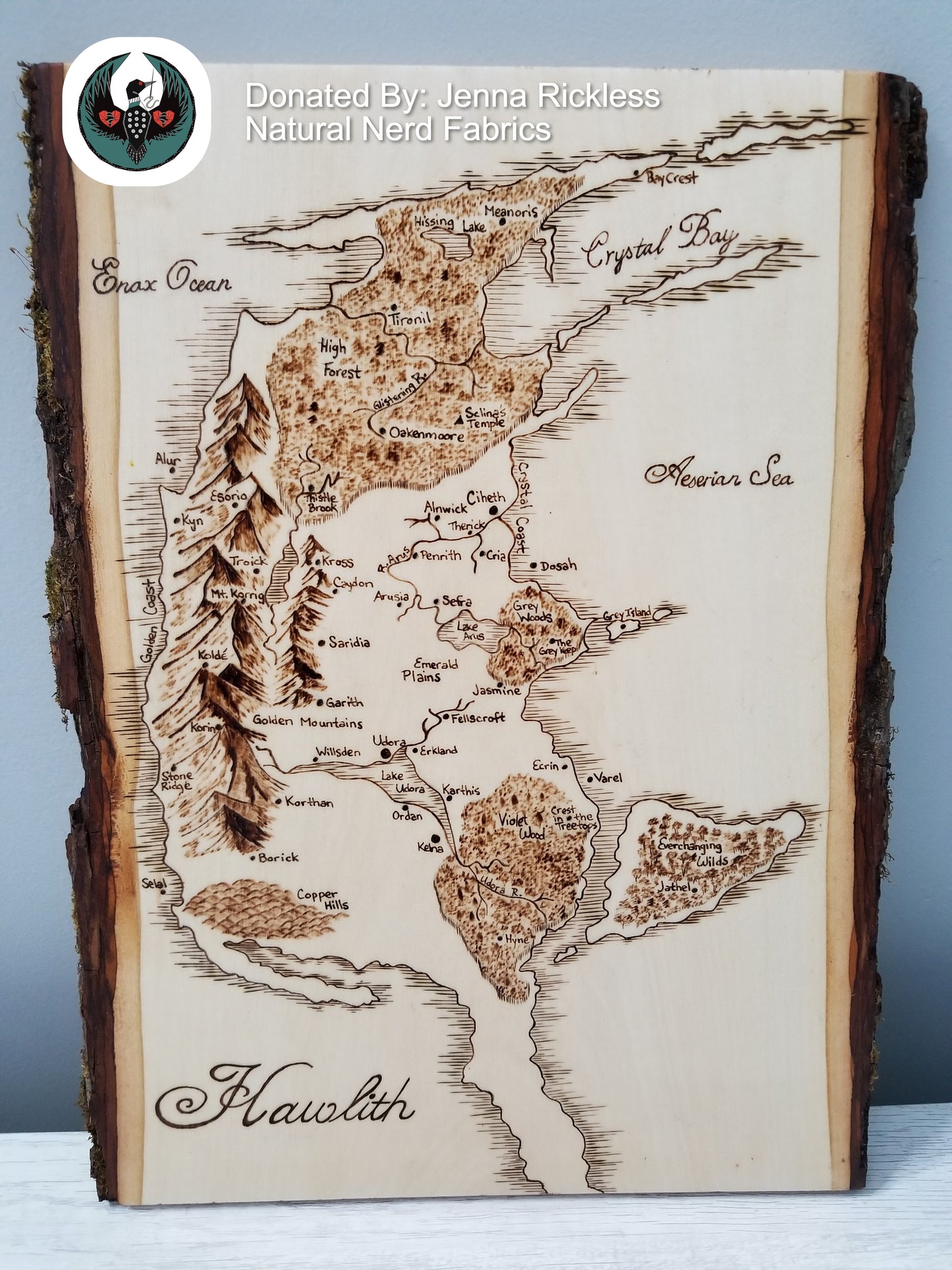 Wooden map of Hawlith with engraved details on a wooden board
