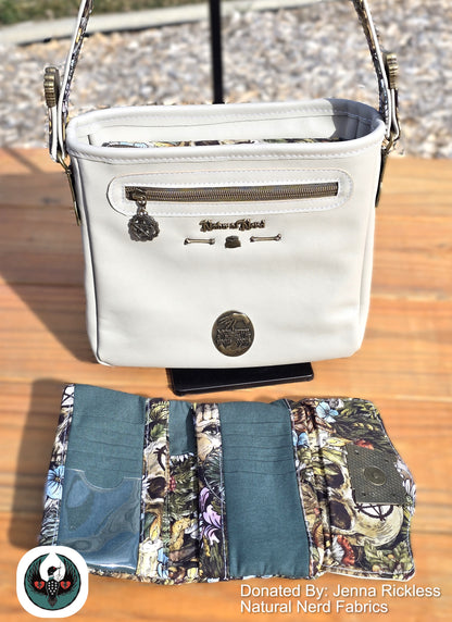 back side of a witchy themed cream leather handbag and the inside of a matching wallet. Wallet interior is witchy florals and green