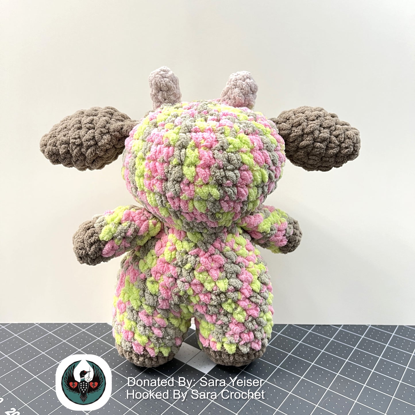 Multi-colored crocheted cow